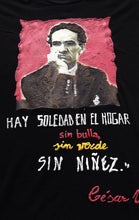 Close-up of César Vallejo hand-painted face with quote "Hay soledad en el hogar..." in permanent raised colors