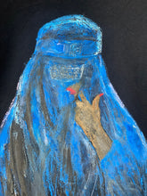  Close-up of the artistic brushstrokes and textured paint used to depict the blue burqa on the hand-painted t-shirt.