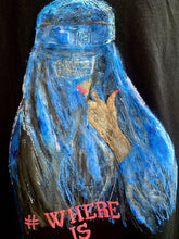 Close-up of the mesh covering the eyes of the veiled Afghan woman, painted in textured detail on a hand-painted t-shirt.