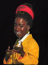 Close-up of Amanda Gorman hand-painted T-shirt showing vibrant 3D relief colors