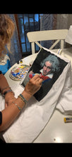 Artist hand-painting Beethoven portrait on T-shirt using 3D permanent colors
