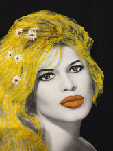 Alternate angle close-up of Brigitte Bardot’s face painted on black fabric, capturing light and shadow details.