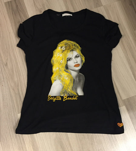 Full view of black hand-painted T-shirt featuring Brigitte Bardot with long blond hair and white daisies.