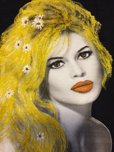 Vivid close-up of Brigitte Bardot’s painted face on black background, highlighting her expression and hair texture.
