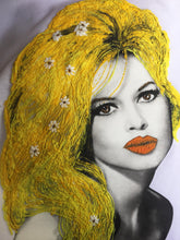 Detailed close-up of Brigitte Bardot’s face on hand-painted white T-shirt with soft shading and lifelike features.