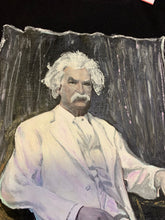 Close-up of Mark Twain's face painted on black T-shirt in permanent textured colors