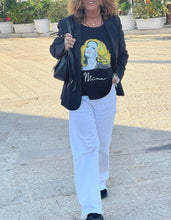 Wearable art t-shirt with Mina portrait on a model