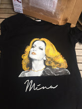 Original Mina t-shirt with textured hand-painted design – exclusive art to wear and its packaging