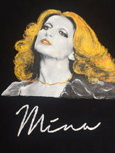 Vibrant colors and brush strokes in Mina t-shirt artwork