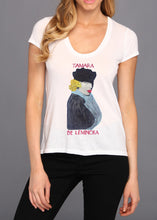 Female model wearing a hand-painted Tamara de Lempicka t-shirt, showcasing an elegant Art Deco portrait and vibrant relief painting technique.