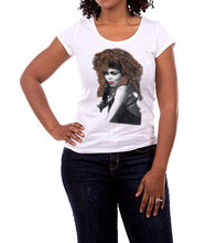 black model wears white t-shirt with a hand-painted  portrait of Tina Turner, featuring expressive textures and unique artistic style.