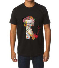 Black T-shirt with colorful hand-painted portrait of Keith Richards worn by male model – bold and artistic look