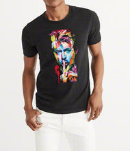 Worn by man black T-shirt showcasing a vivid and textured 3D painted David Bowie design – artistic and eye-catching

